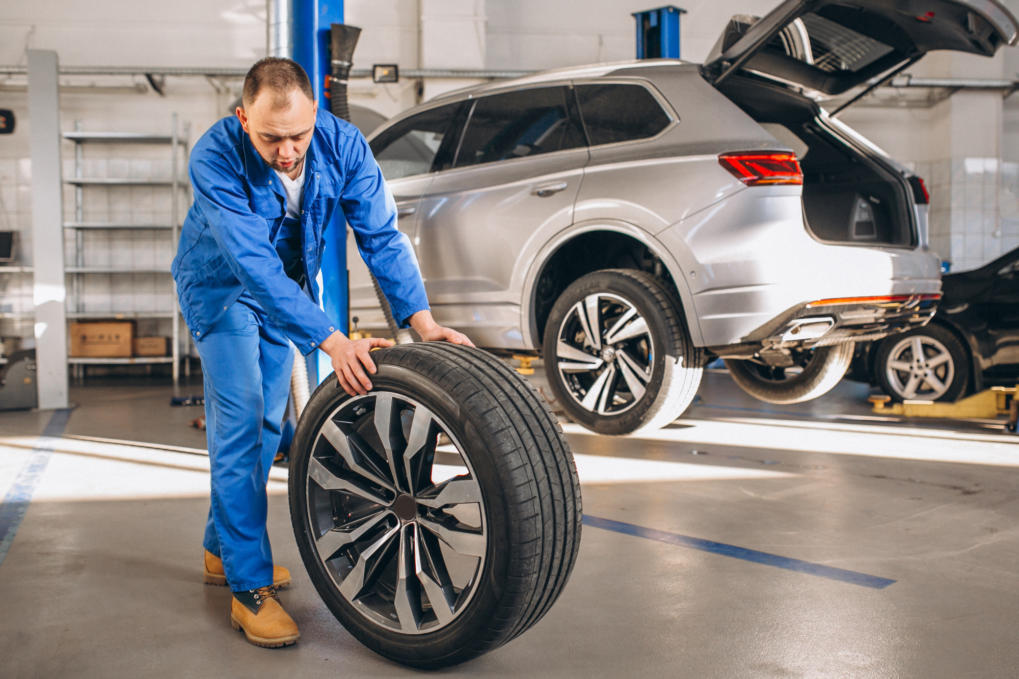 auto-mechanic-checking-car